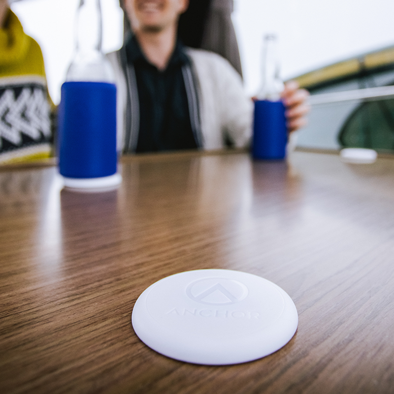 This Spill-Free Coaster on  Can Attach to Any Surface