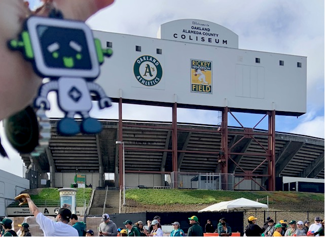 RoBert watching a baseball game at the Oakland Alameda County Coliseum in California