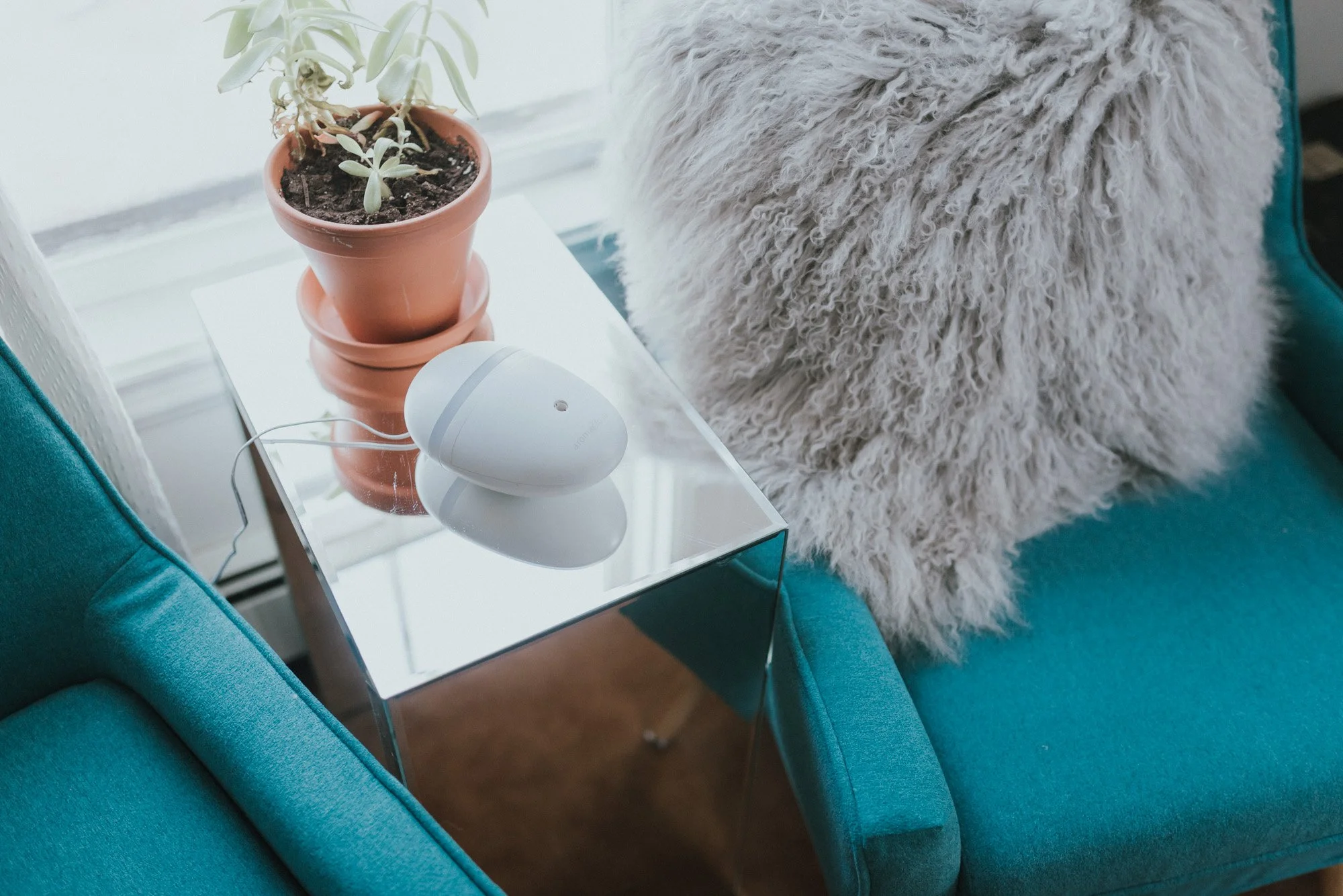 The Wild Decoelis | Master Bedroom Update | sitting area in bedroom with saje diffuser