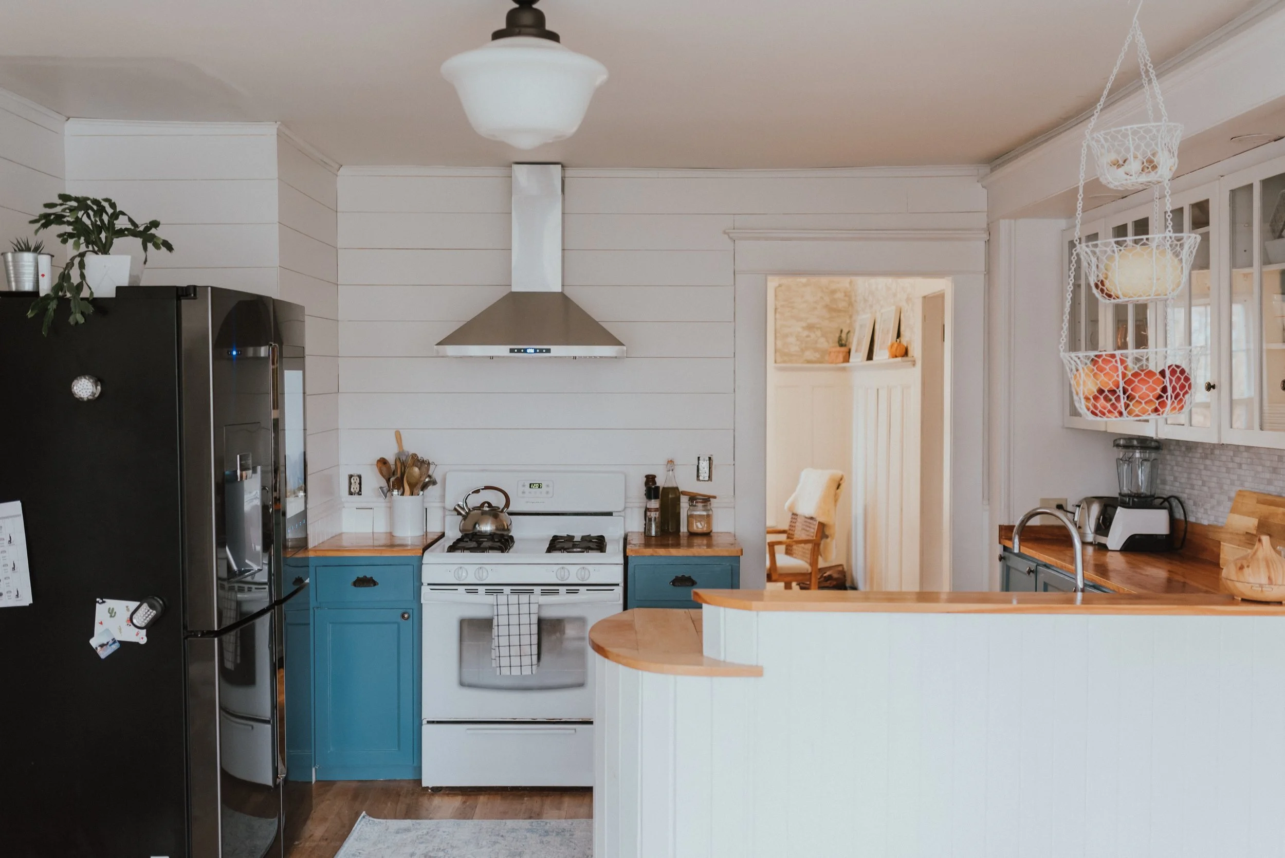The Wild Decoelis | How We Transformed Our Kitchen For Under $1500 | after | Behr Blueprint kitchen