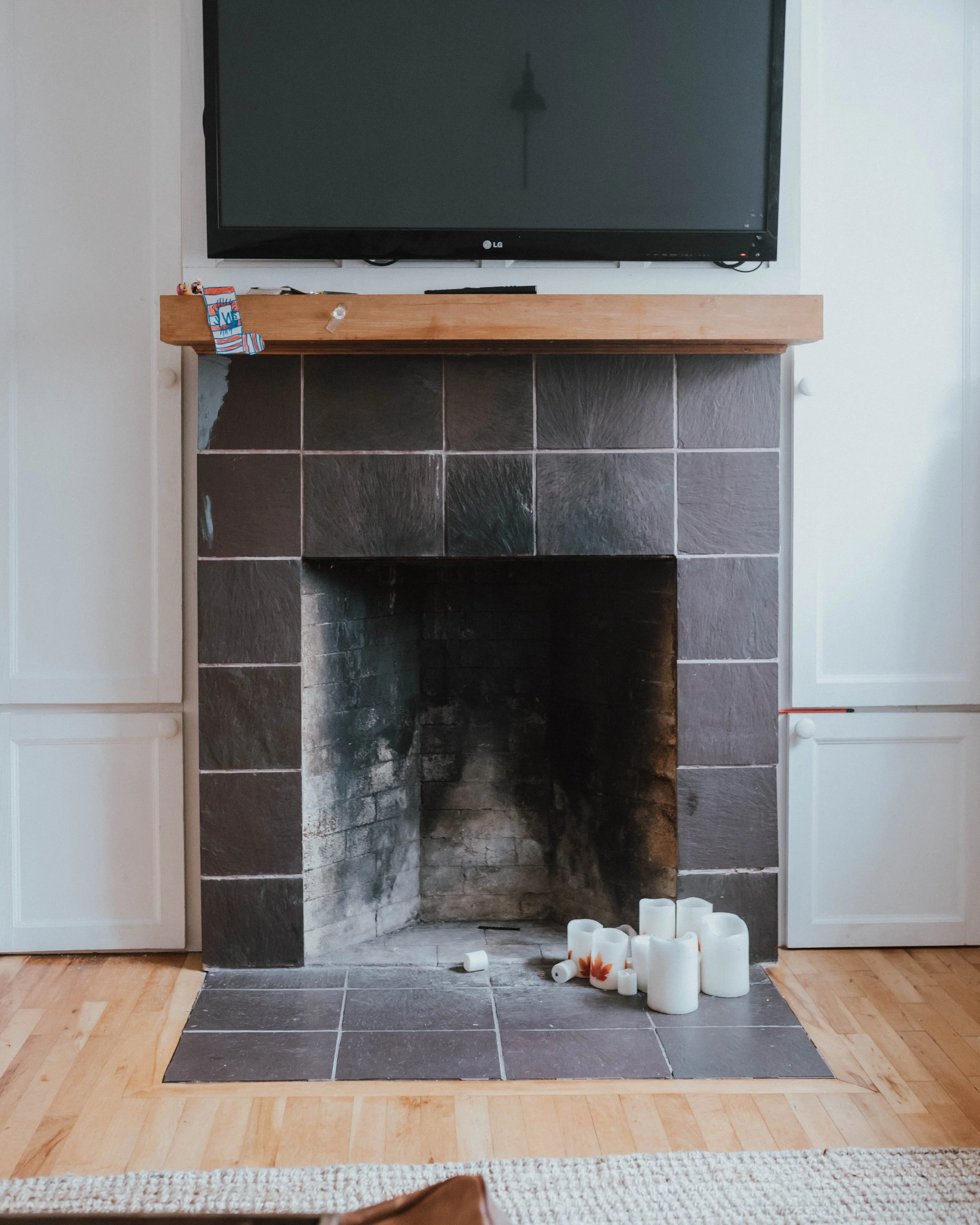My $100 Fireplace Makeover with Behr Paint | The Wild Decoelis | Before