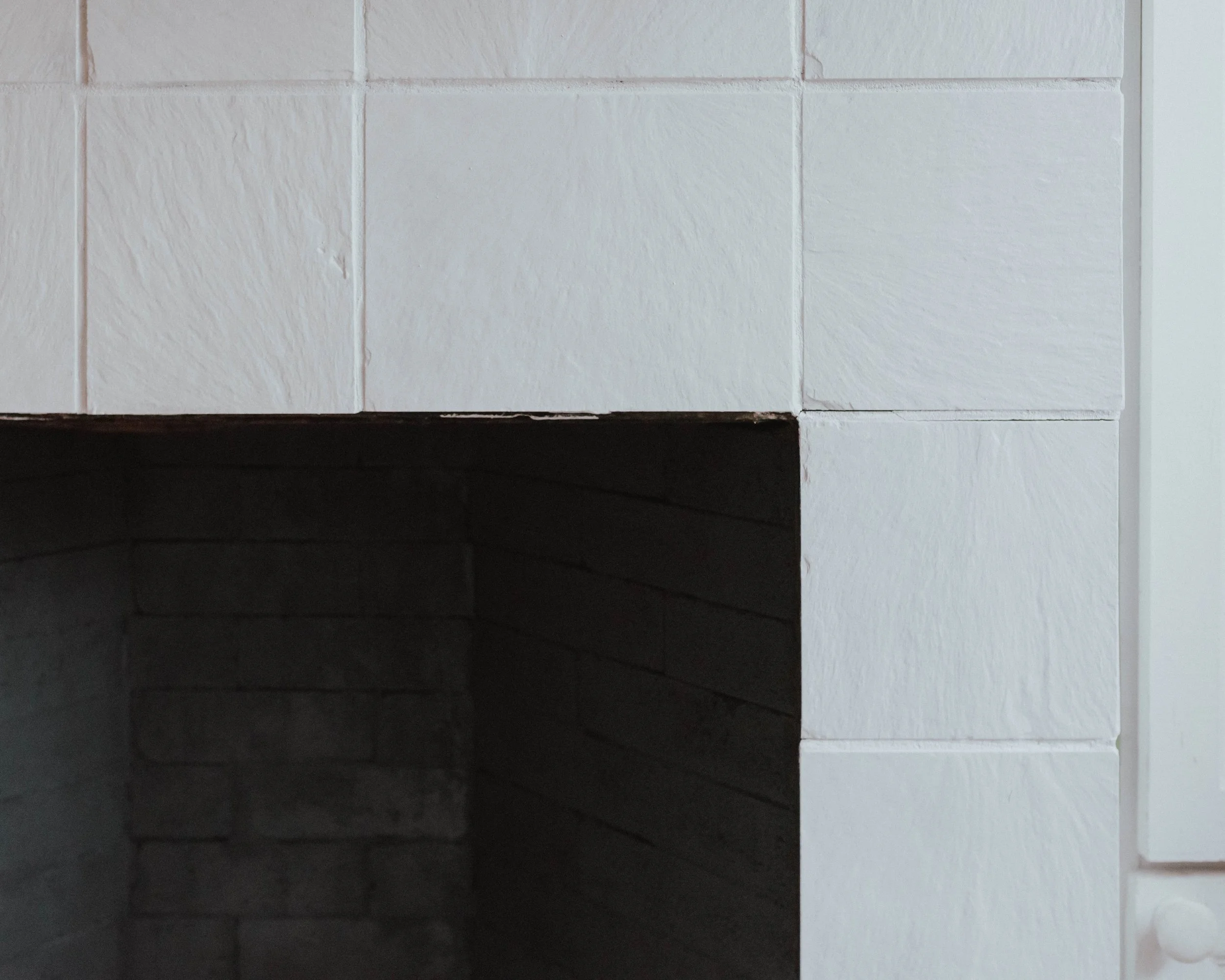 My $100 Fireplace Makeover with Behr Paint | The Wild Decoelis | Behr Painters white and Classic Noir