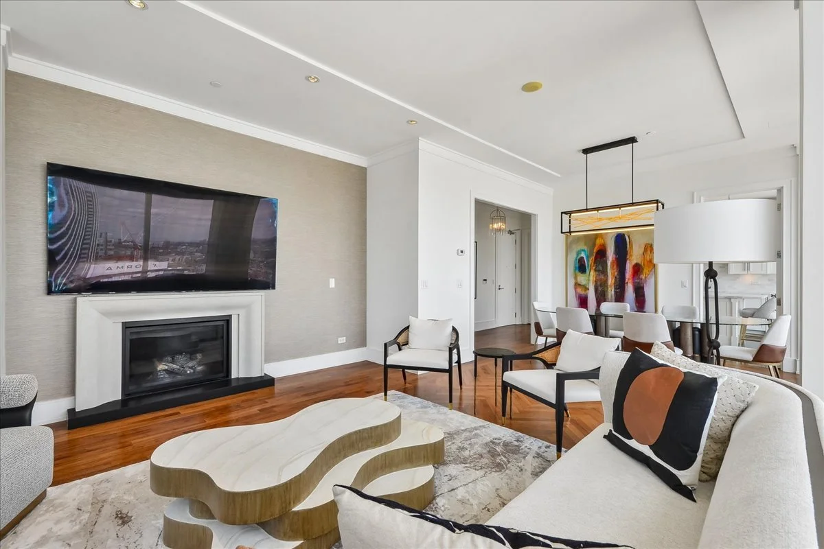Suite 3703 — Living Room with Fireplace