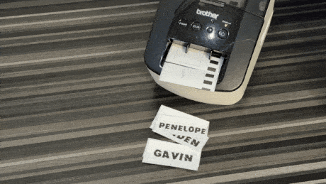 Animation of printer spitting out name tags
