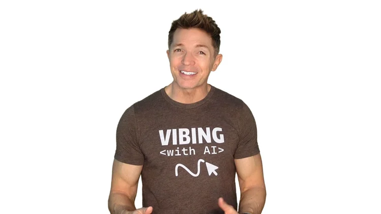 Photo of Tony smiling and wearing a Vibing with AI t-shirt
