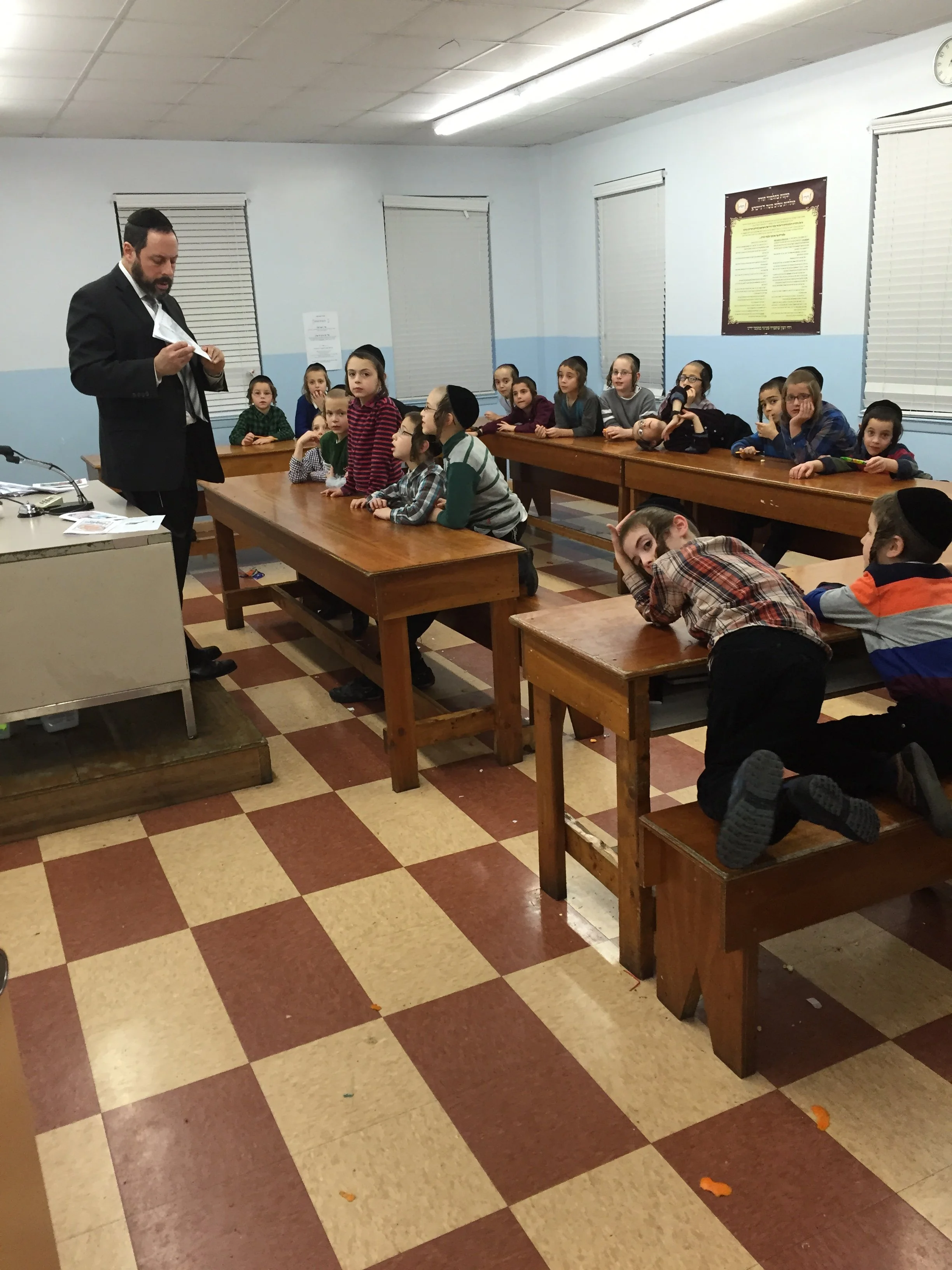 Dr. Hoff introducing writing topics to a class