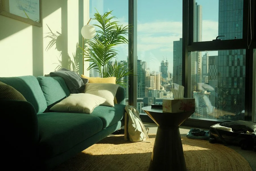 Sunlit apartment interior with city view