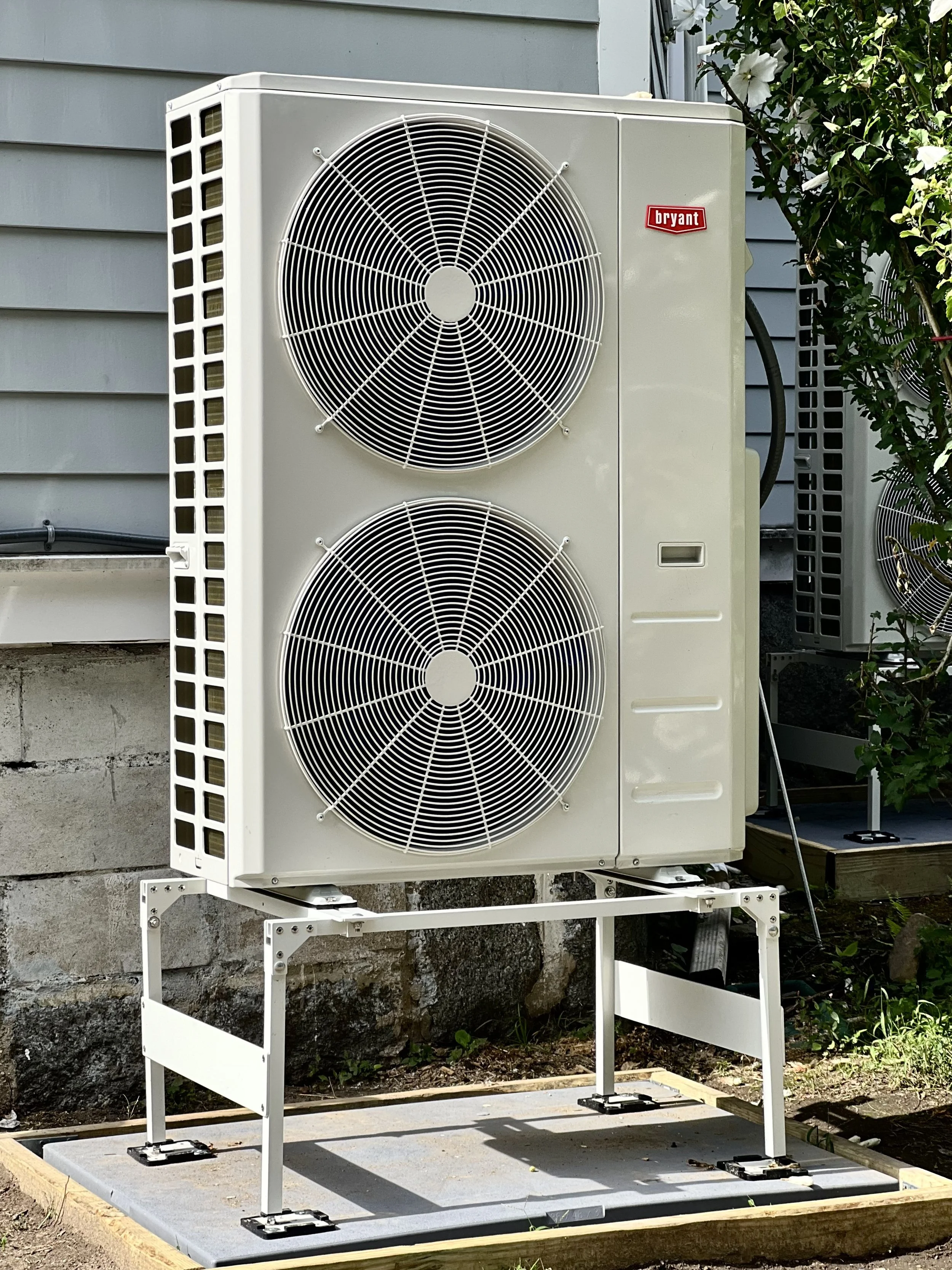High-efficiency heat pump unit installed outside Temple HBT's classroom and office building