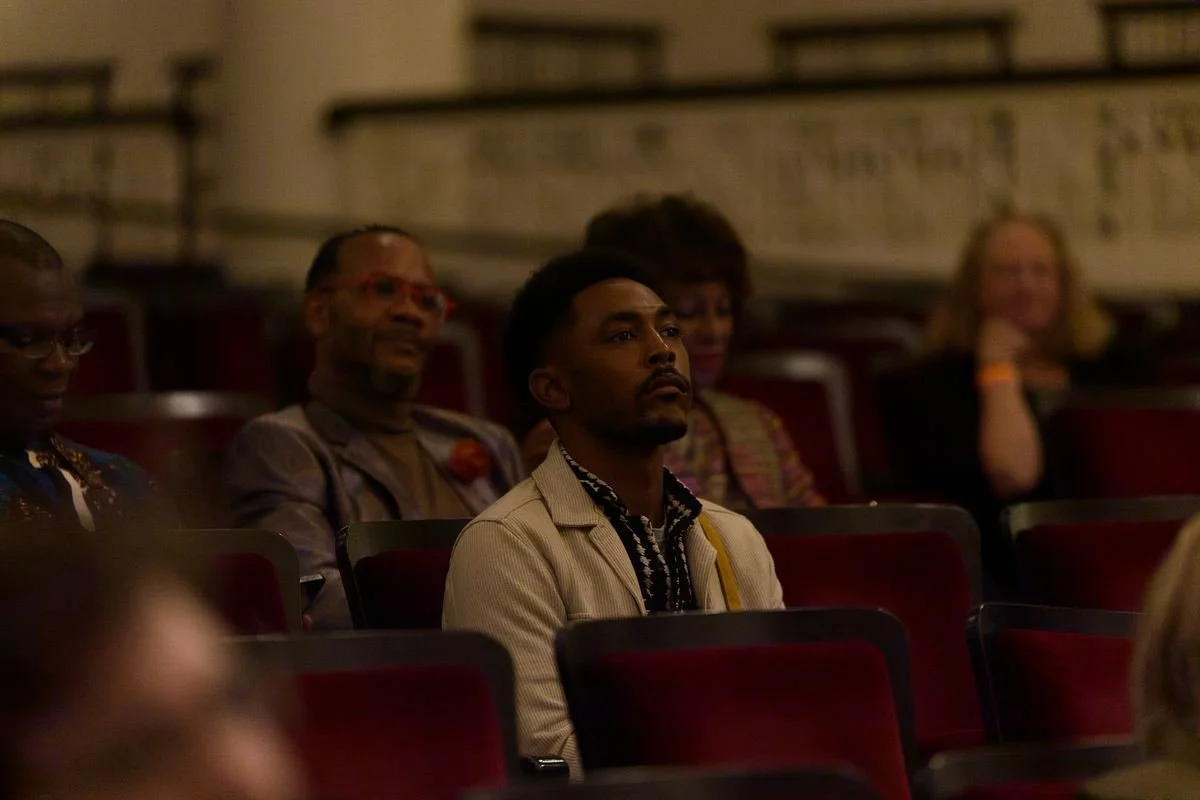 Audience seated in a theater