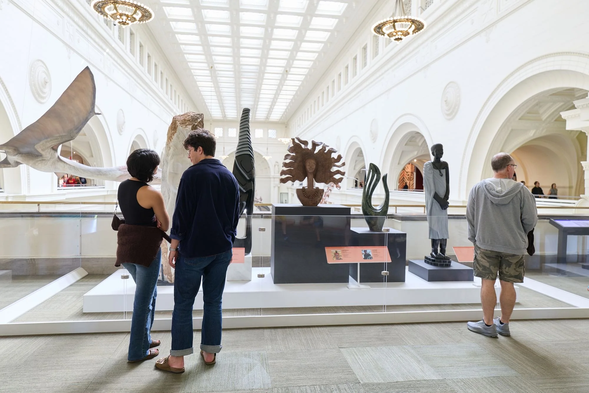 Guests in a museum-scale hall