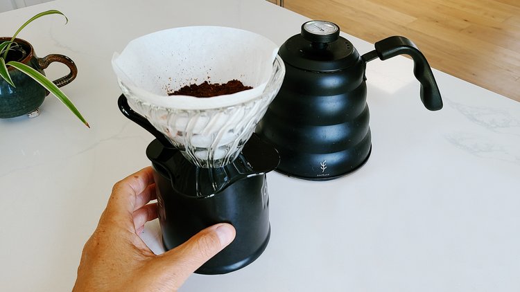Photo of a single-cup pourover over a coffee mug