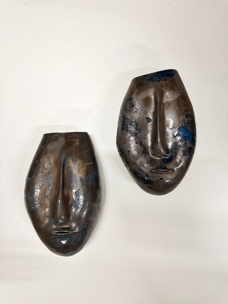 What Weathers Together, porcelain masks of a couple