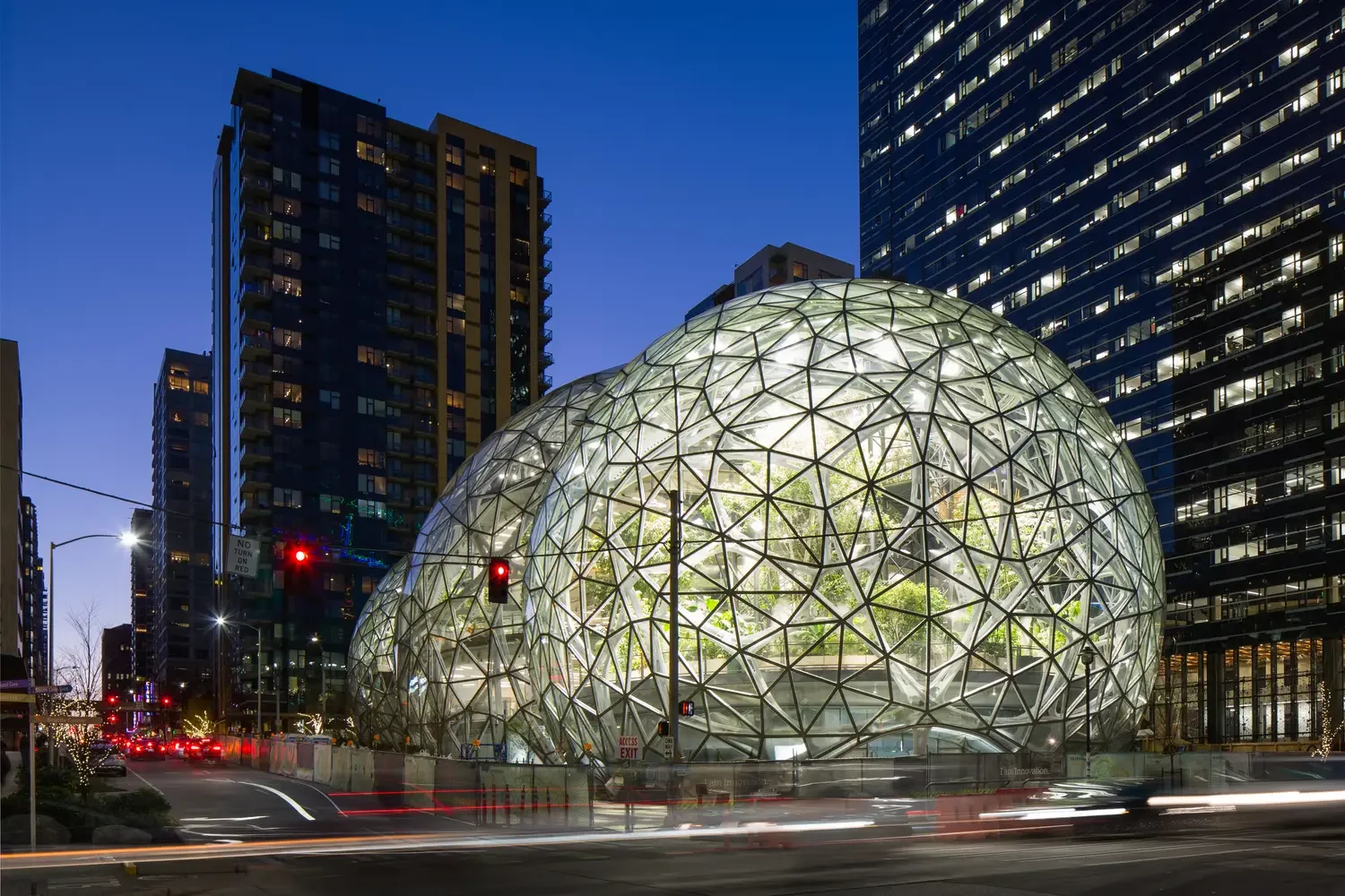 The illuminated Amazon Spheres in Seattle at dusk, a ProClean NW project with Sellen Construction