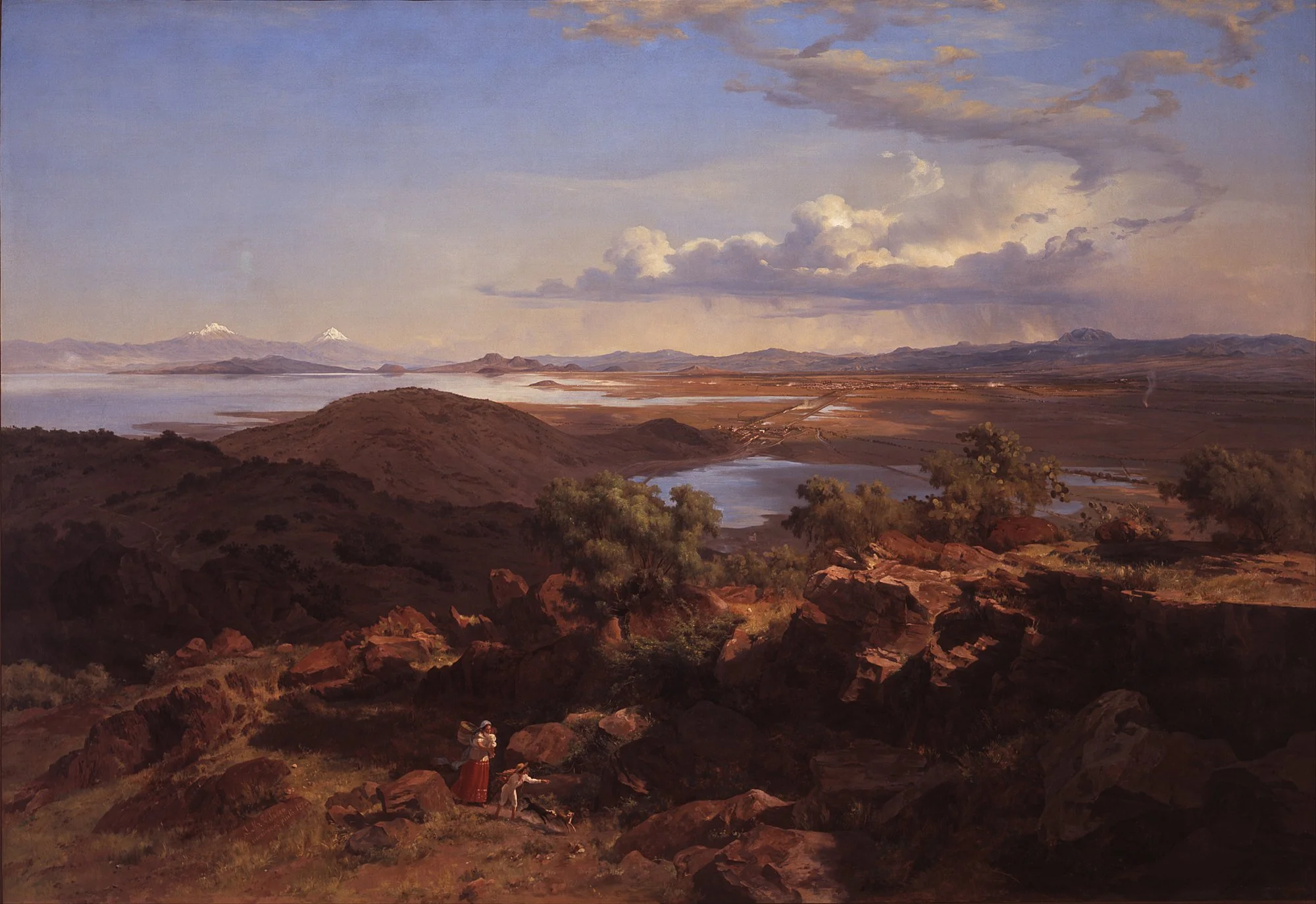 Pintura de paisaje: desde un cerro rocoso en primer plano se domina el valle de México, con el lago de Texcoco brillando a la izquierda, la llanura, la ciudad a lo lejos y los volcanes nevados en el horizonte bajo un cielo de nubes