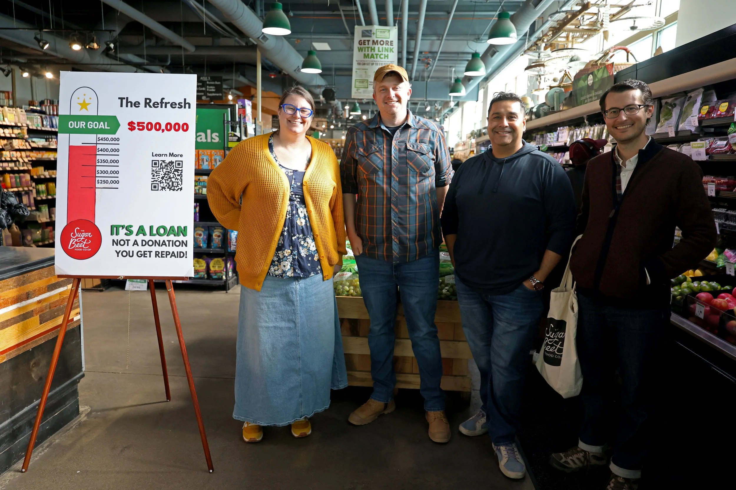 Sugar Beet leadership and board members beside the Refresh Campaign goal tracker