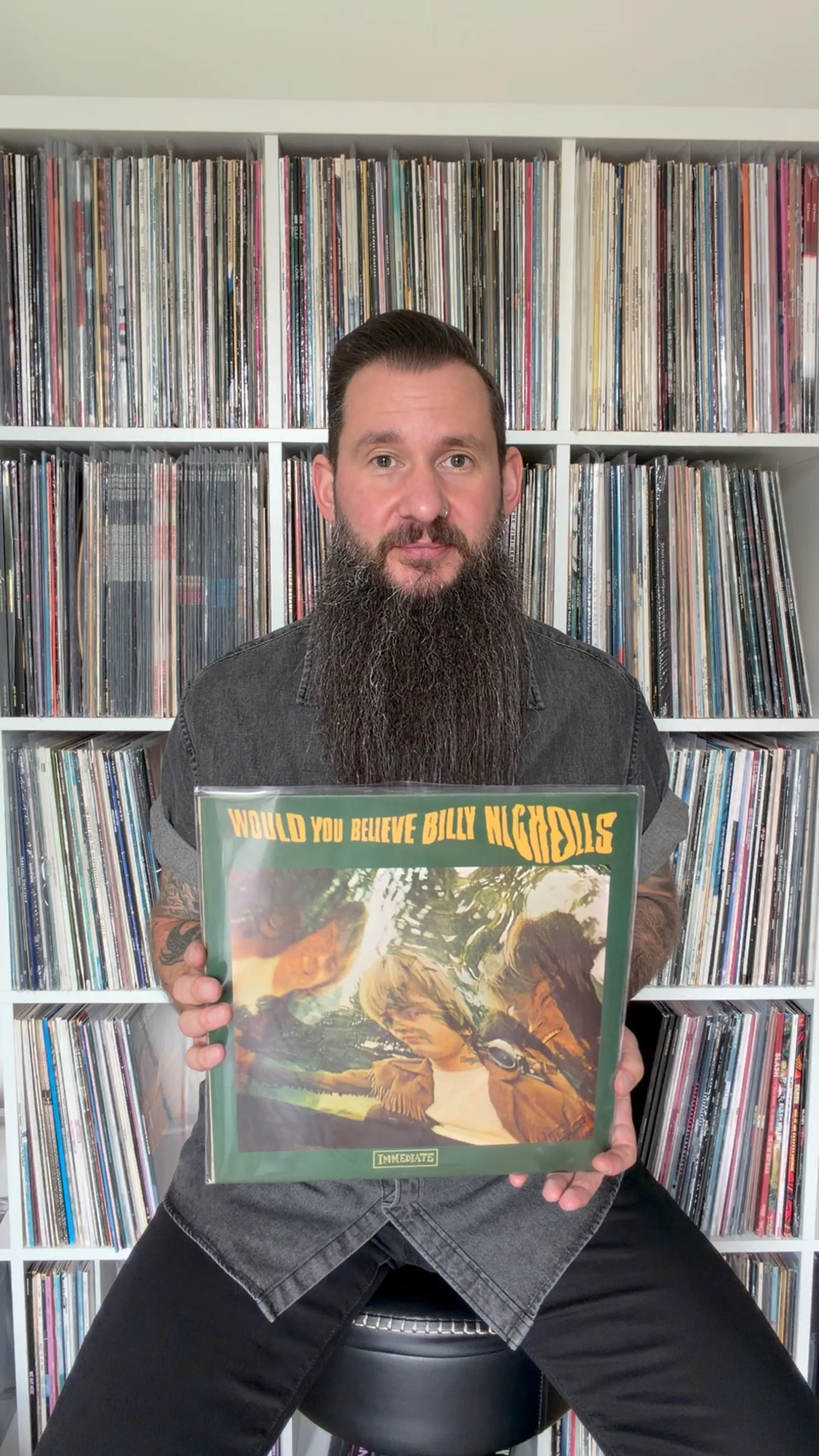 Martin Hughes of Wessex Auction Rooms holding the original 1968 copy of Would You Believe