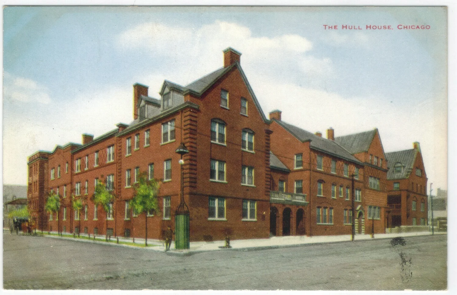 Postcard view of Hull House, a large brick building in Chicago