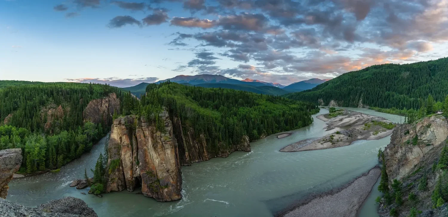 Panoramic braided glacial river running through Alaskan mountains