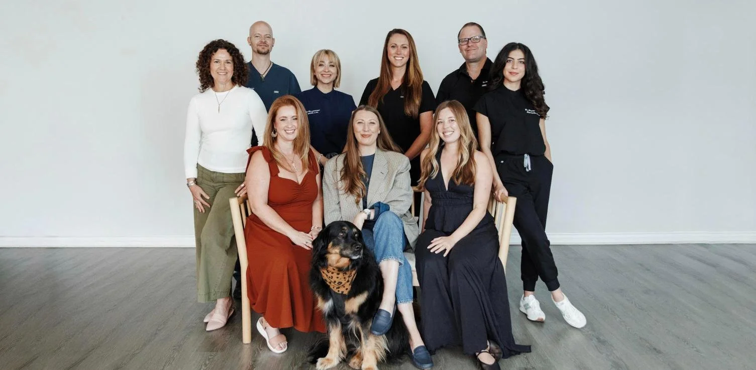 The Saffron & Sage team, with Harper the therapy pup, at our San Diego clinic