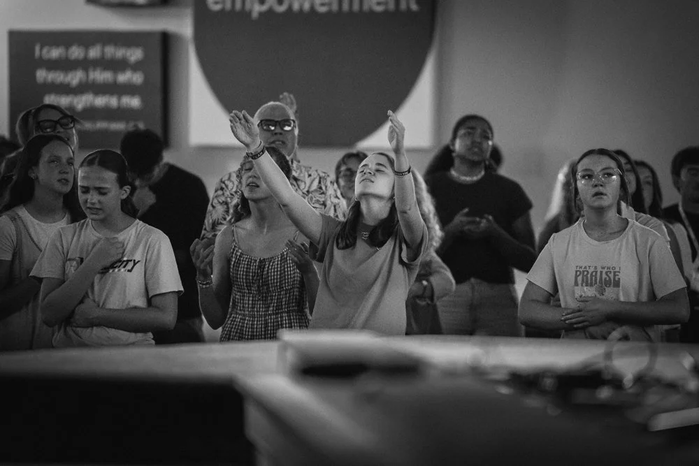 Young people worshiping with the Open Door congregation