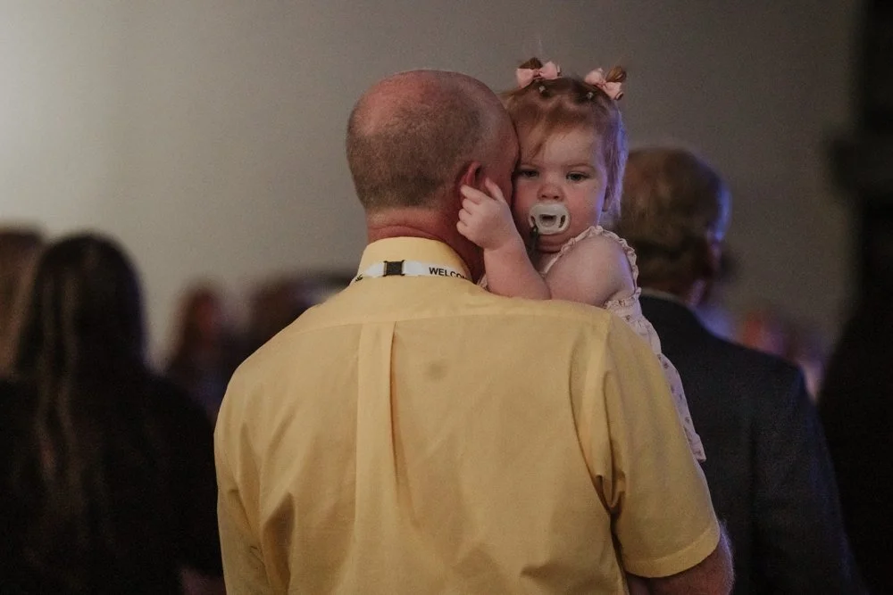 A family sharing a moment at Open Door