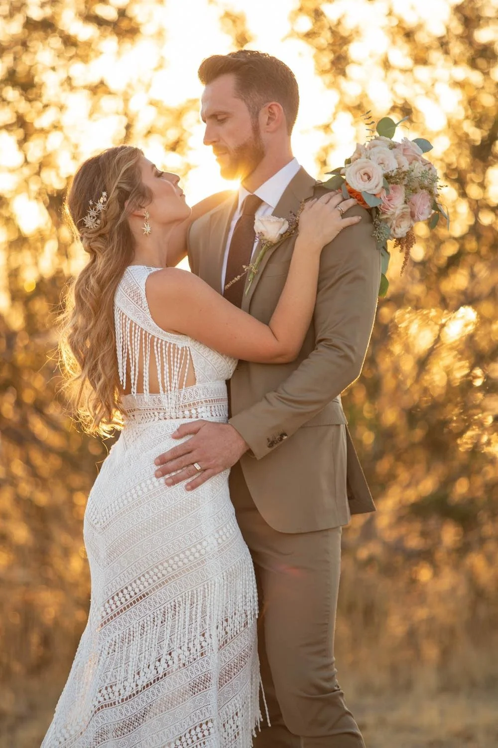 Bride and groom sharing their first dance at their intimate desert wedding reception at Serenity Escape in Yucca Valley