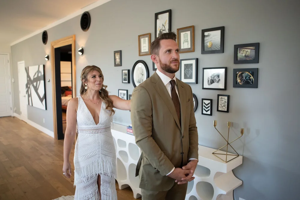 Emotional first look moment as the groom sees his bride for the first time at their Serenity Escape desert wedding in Yucca Valley