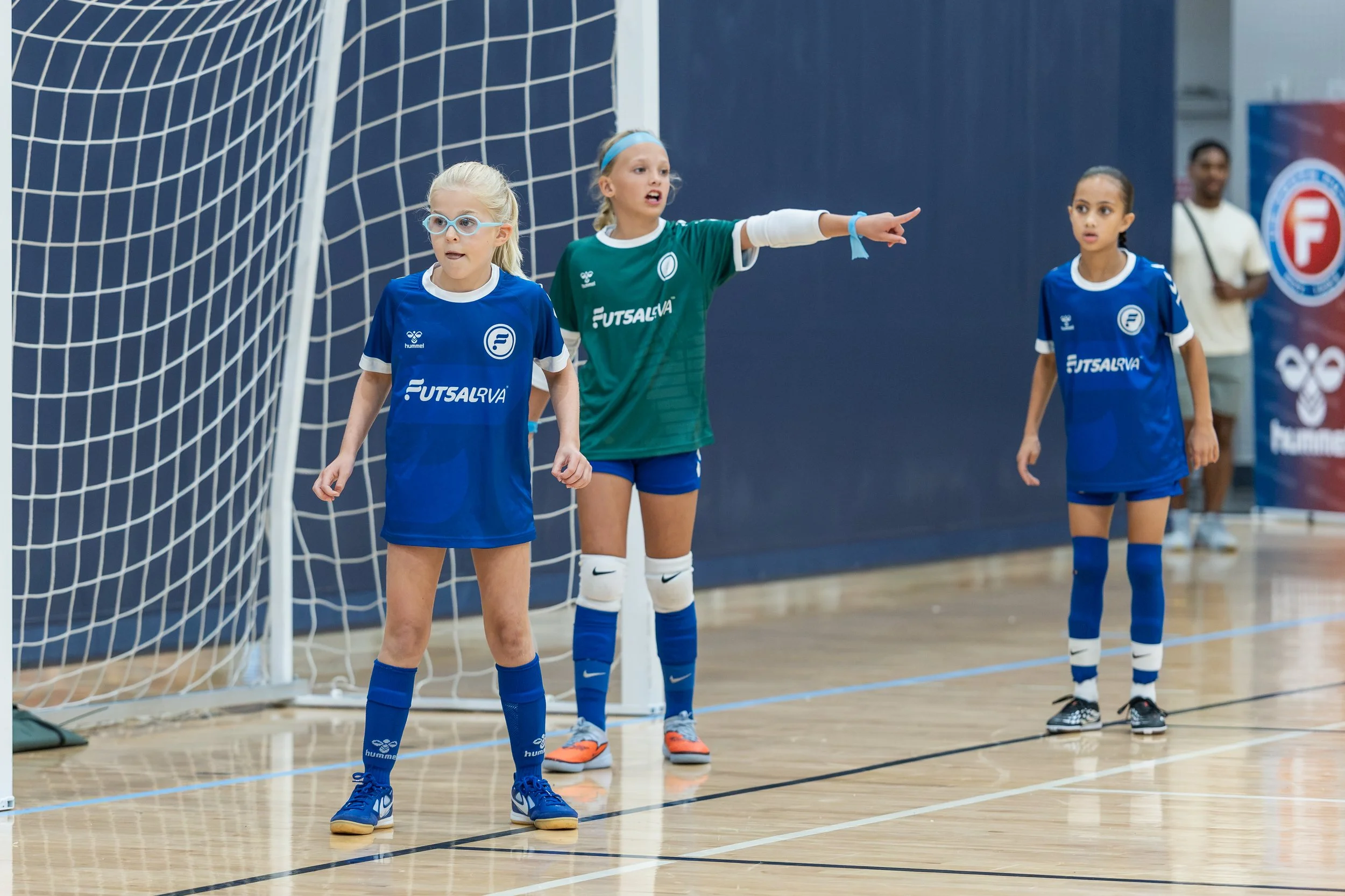 FutsalRVA girls team in blue jerseys during a game