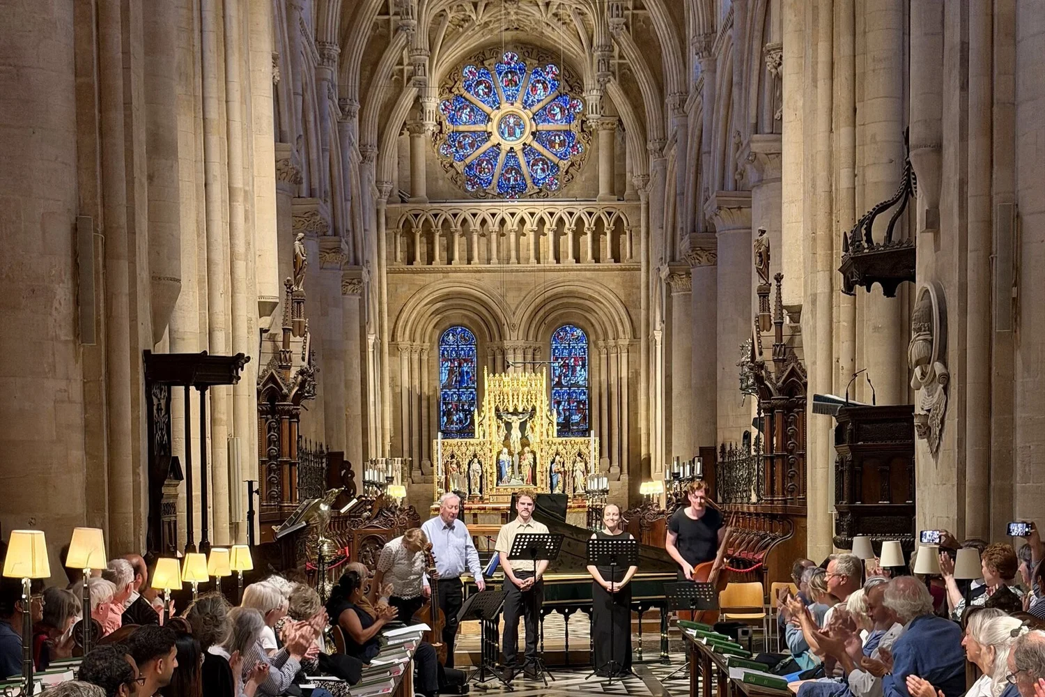 Audience applauding IT&T musicians in the nave of Christ Church Cathedral