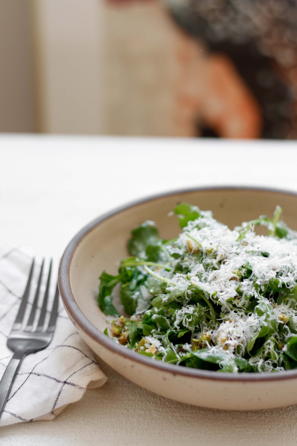 Arugula salad with lemon and candied pistachios