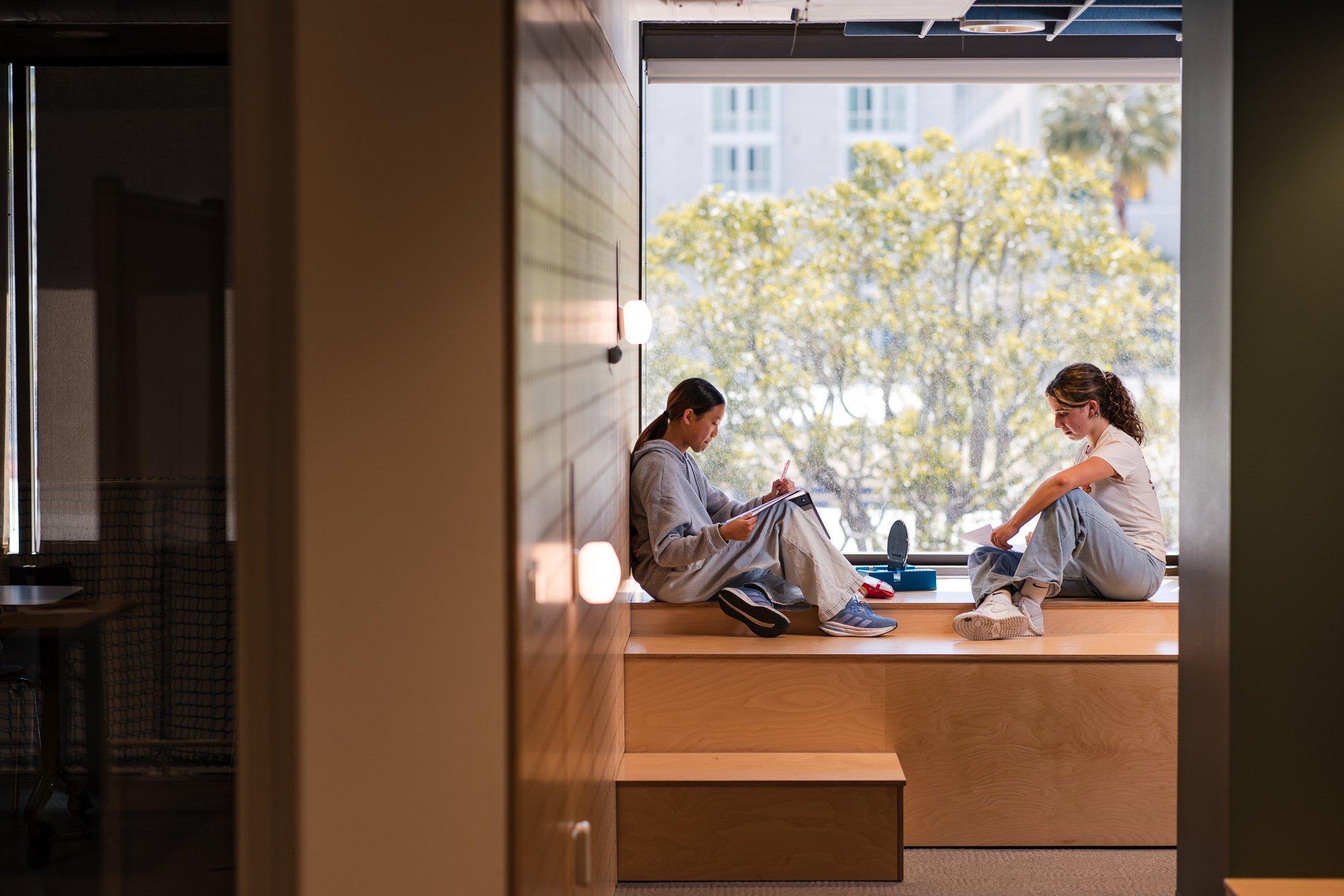 Proofniks studying together in the window nook