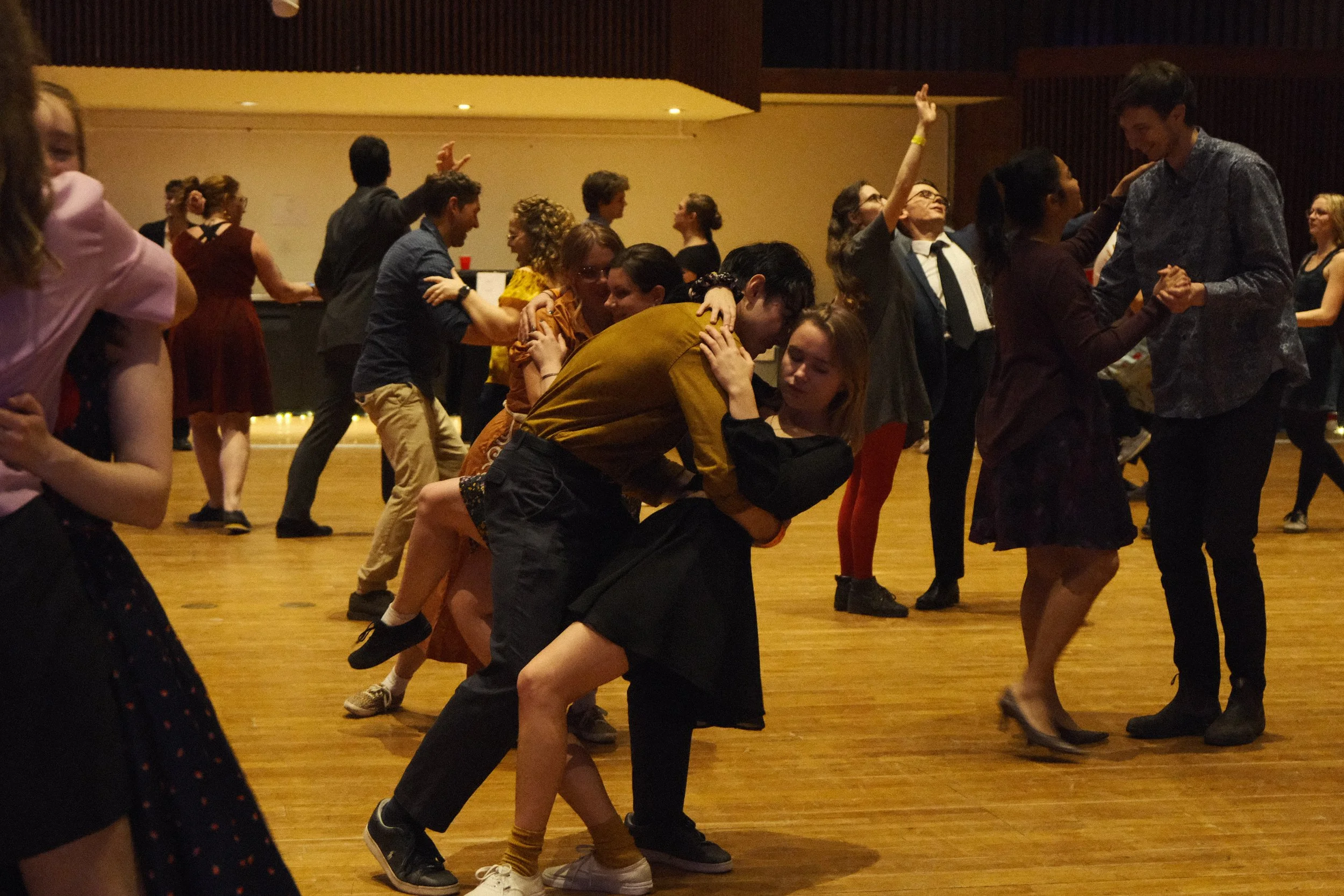 Dancers dipping at a live social with a live band