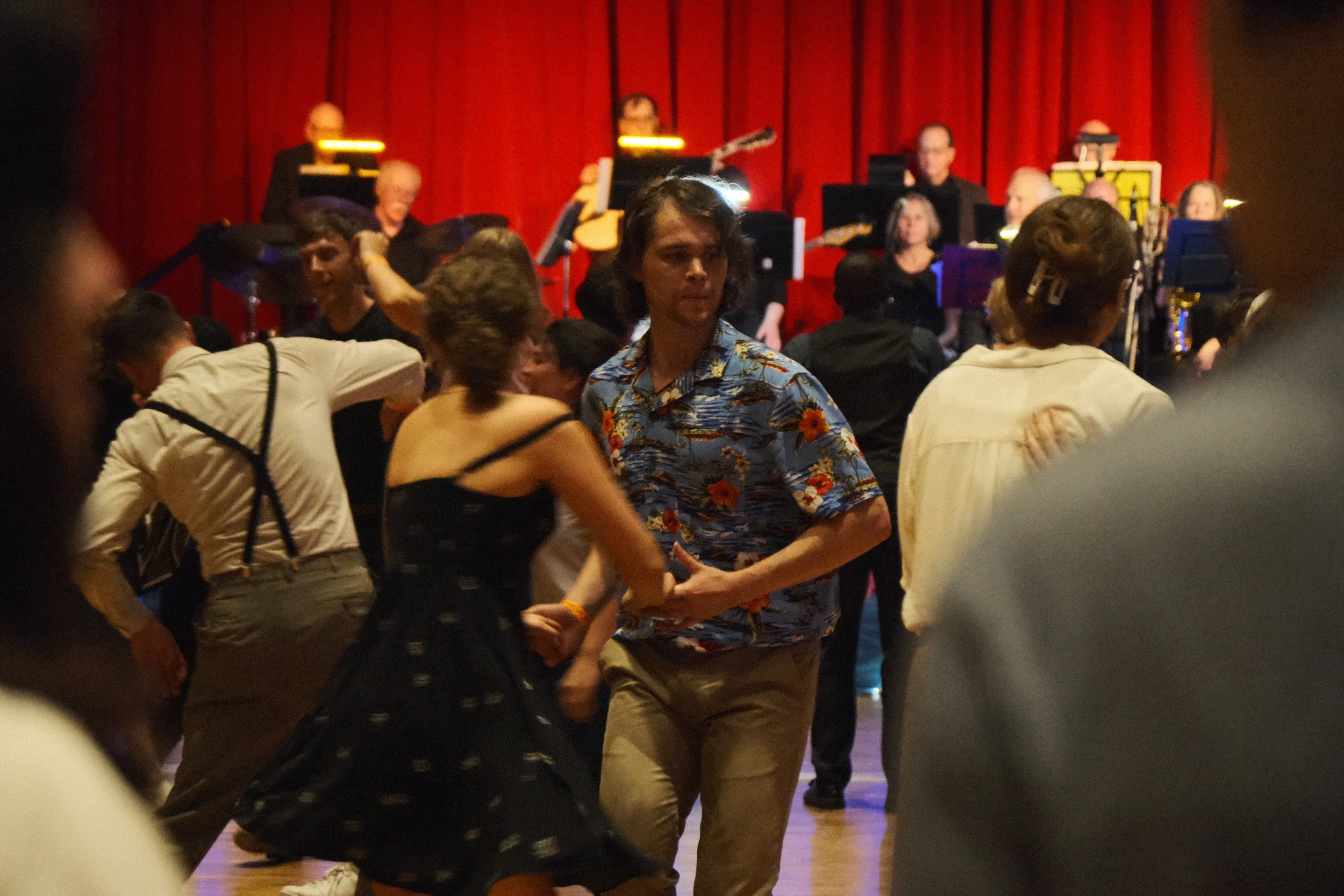 Dancers dancing to a live band