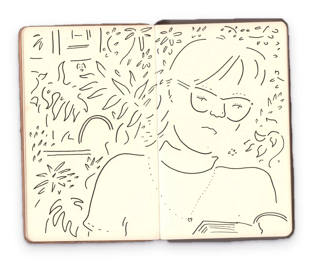 Sketchbook spread of a woman in glasses reading, with leafy plants filling the page