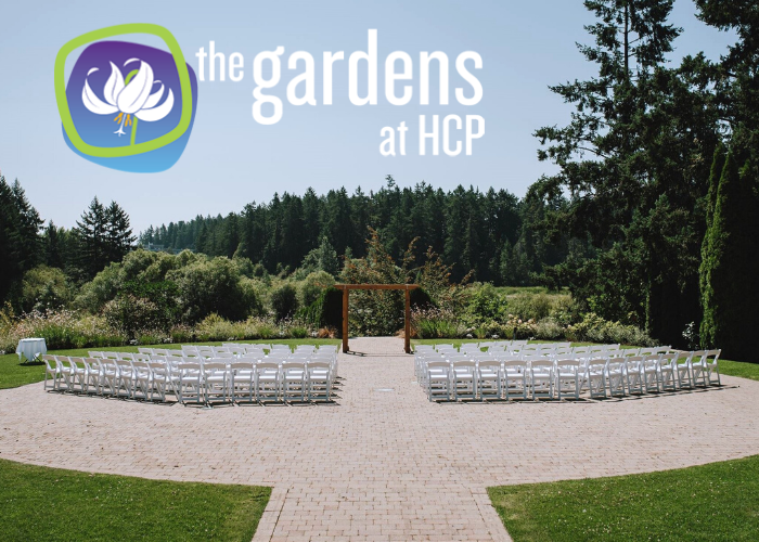 wedding ceremony and archway among gardens at HCP Vctoria BC