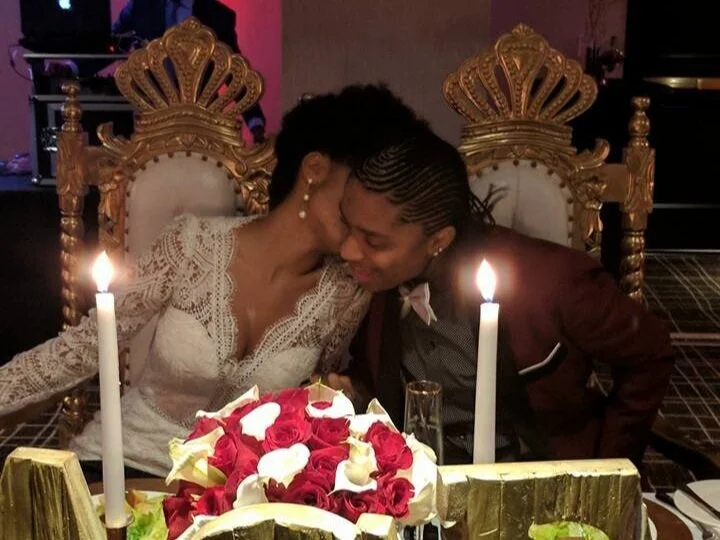 Excited bride and groom exit Harbour View wedding venue as guests wave sparklers