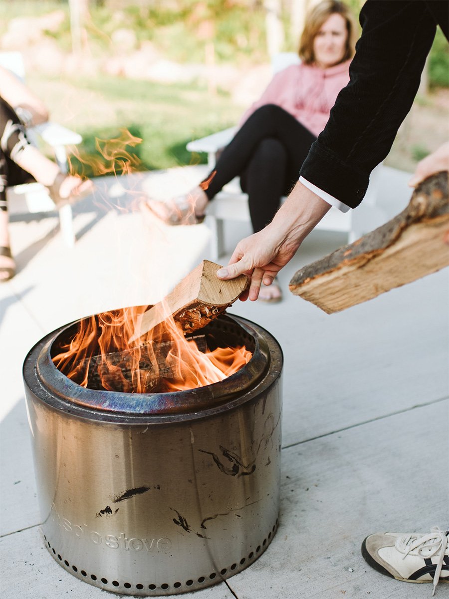 Patio firepit at dusk at Wild Rice Retreats