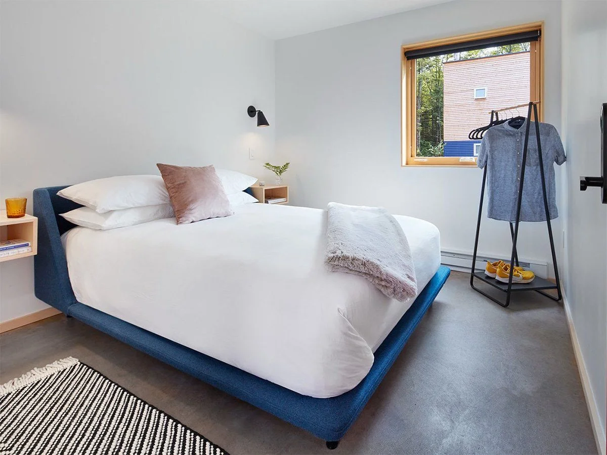 Private bedroom interior inside a Treehaus pod