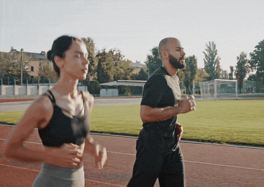 A couple running outdoors — DexaFit lifestyle