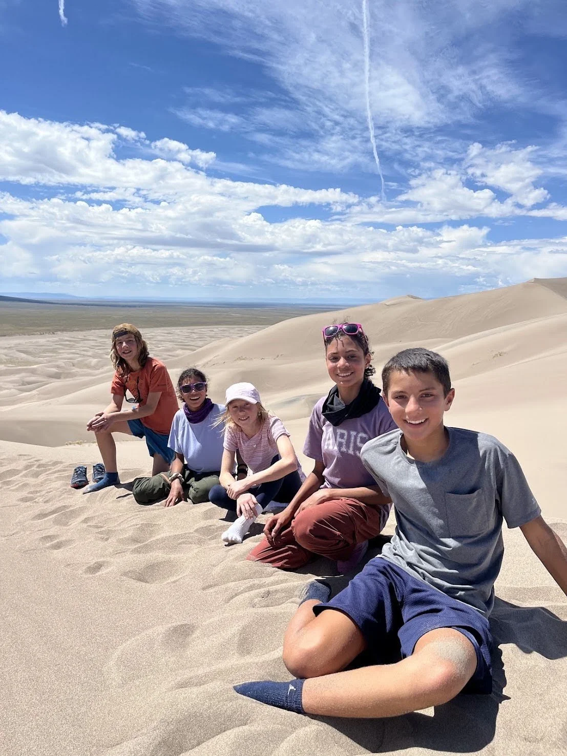 Middle school students doing fieldwork outdoors