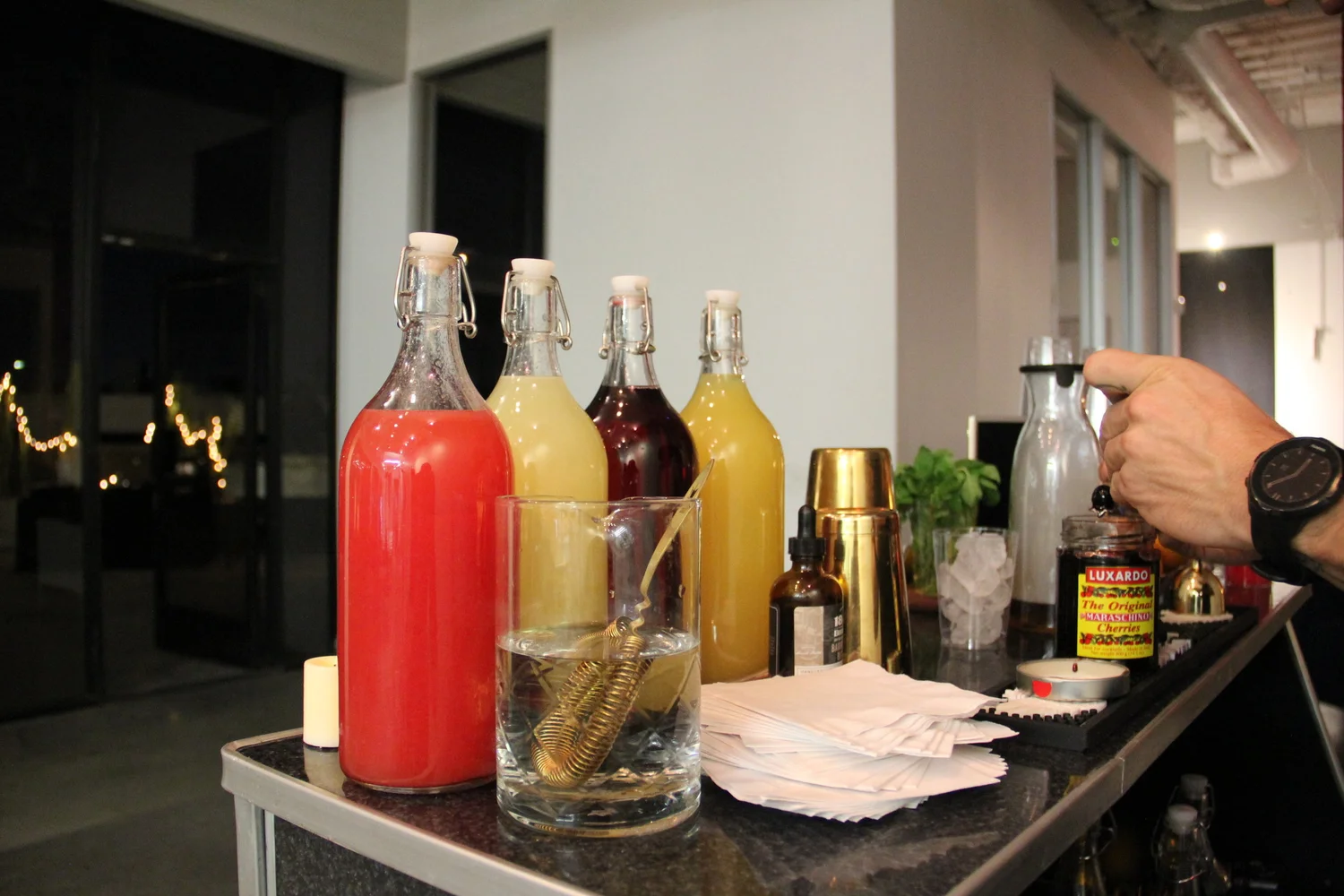Spirits and mixers stocked on an event bar in Los Angeles
