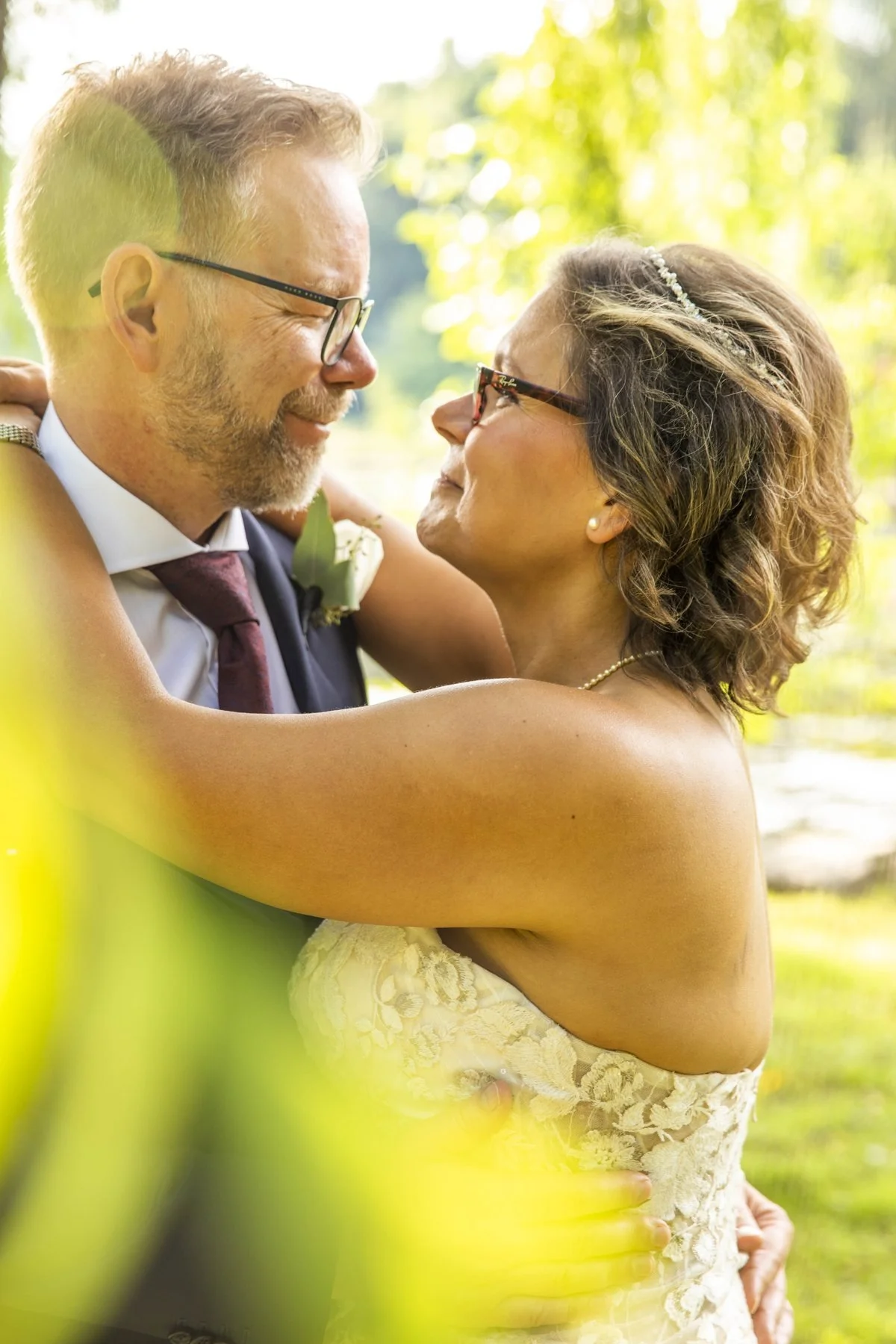 Couple smiling at each other in a close embrace