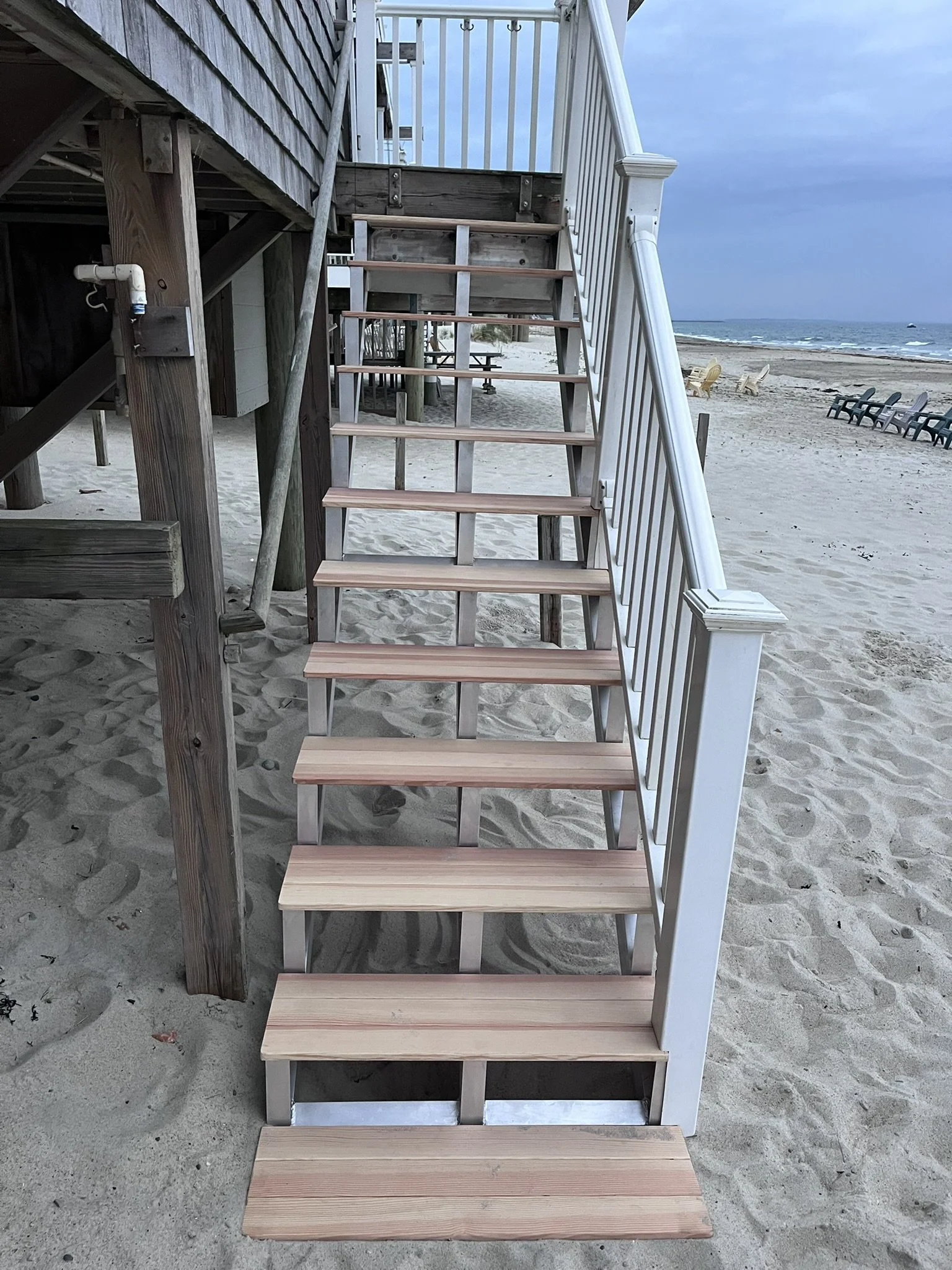 Finished beach house stairs from beach level, full view