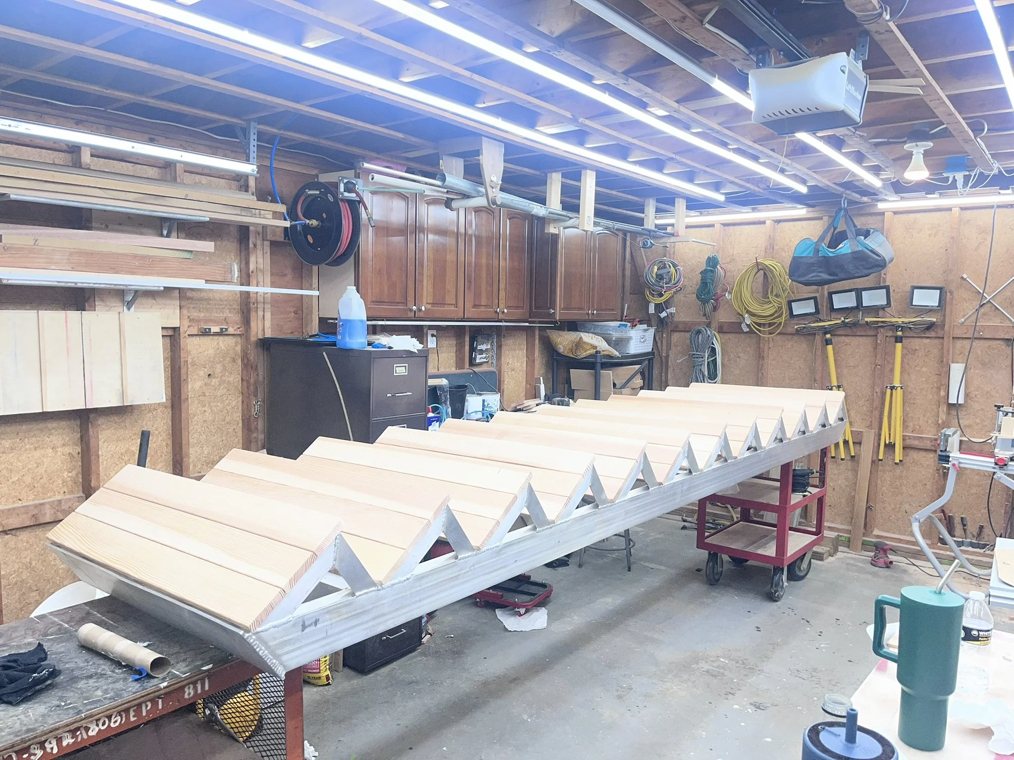 Douglas fir treads being fitted onto aluminum frame