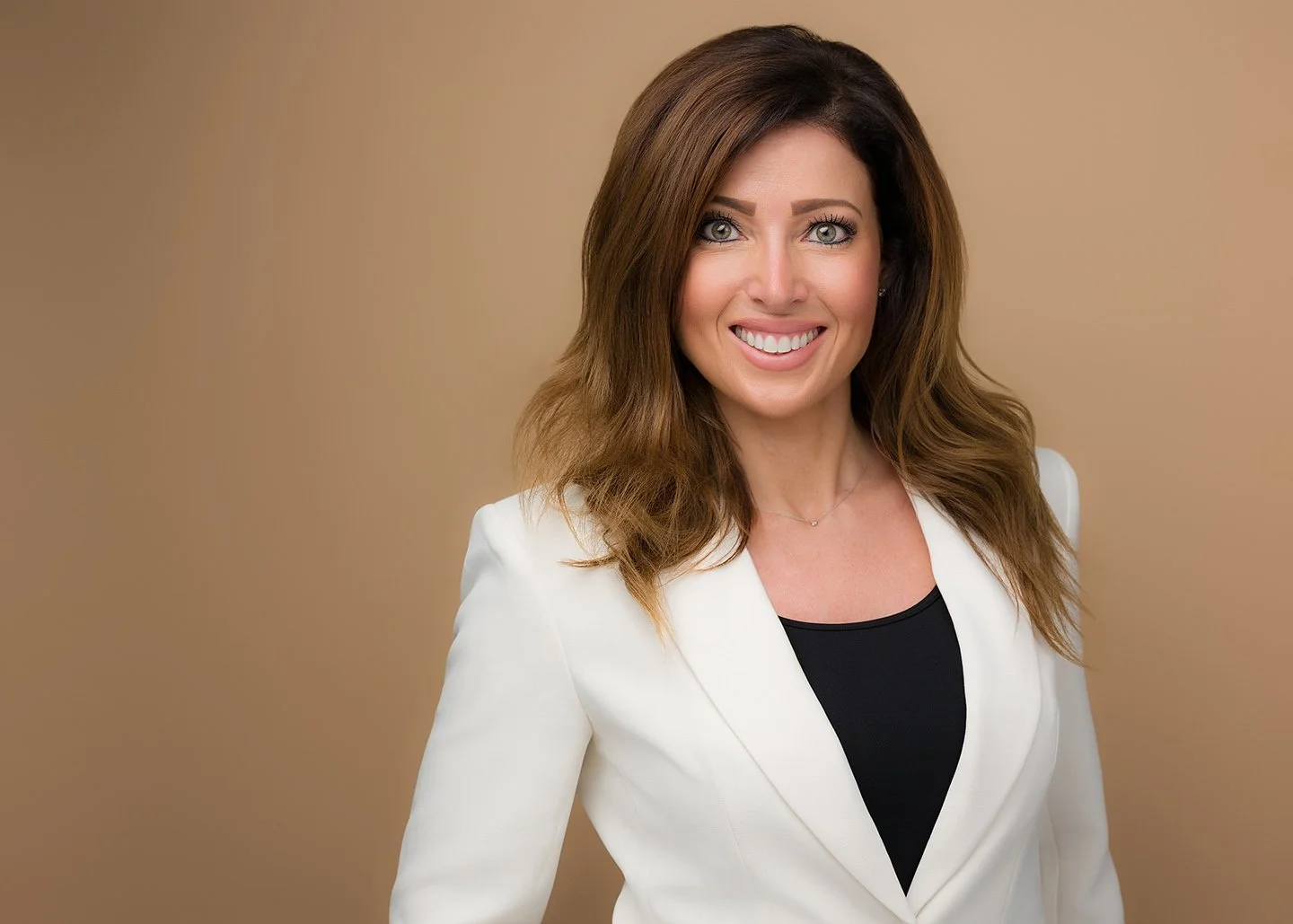 Executive Studio Session headshot example — professional female portrait in blue blazer