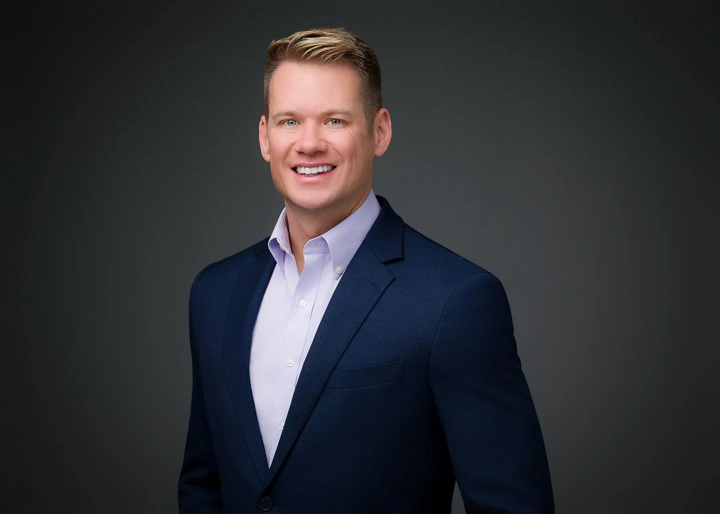 Mobile Studio Location Session headshot example — on-location professional male portrait