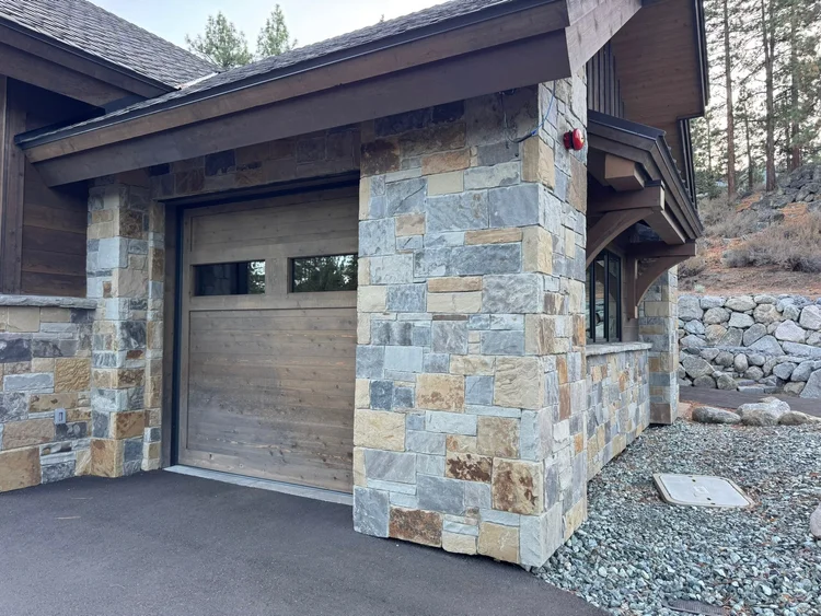 Aspen Estate veneer and Silver Mountain wainscot caps and sills on a facade.