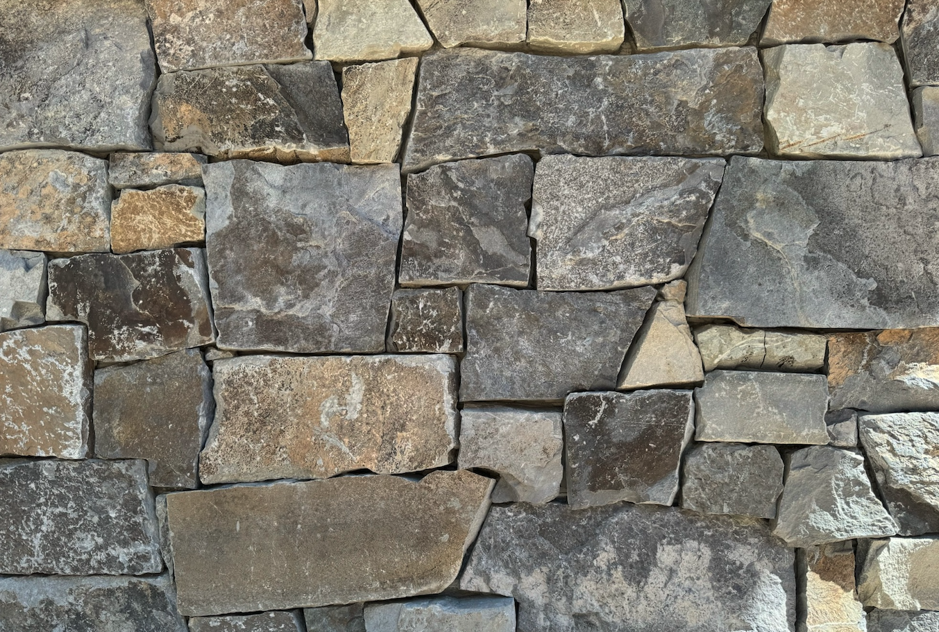 Gallatin River ashlar veneer sample in split and natural faces with chopped ends.