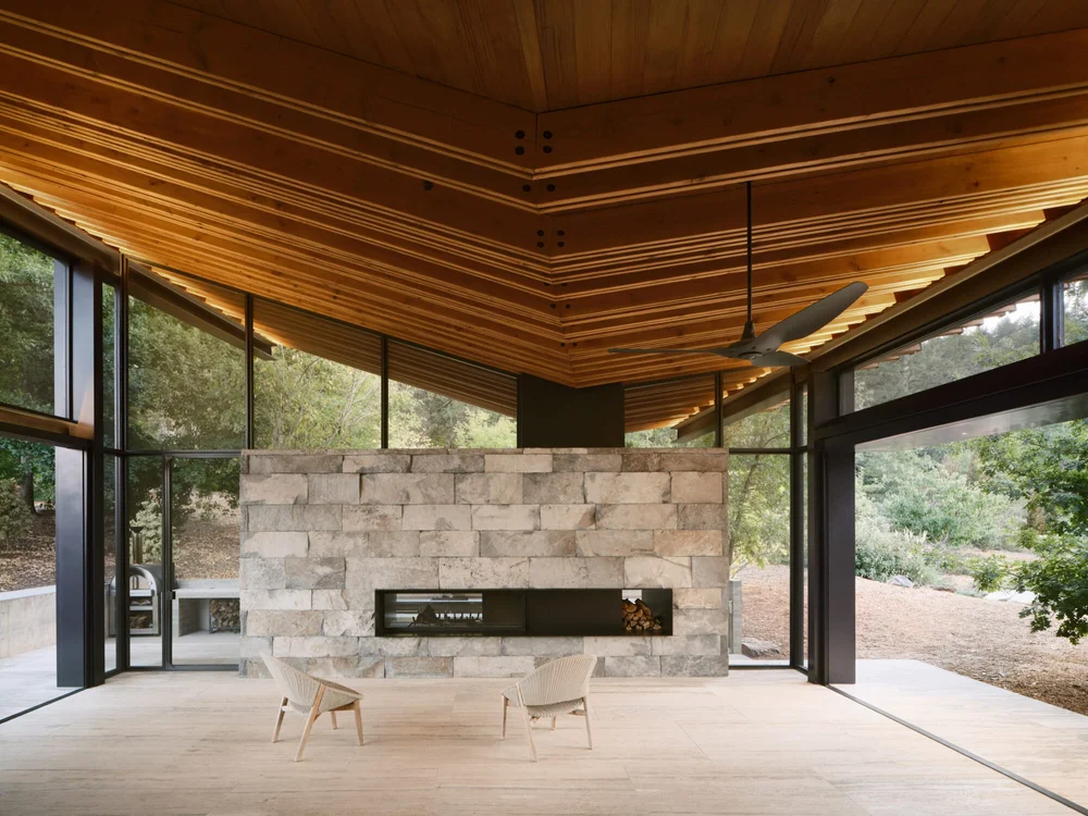 Whistler Basalt panel veneer in a natural face with dry-stack joints across a fireplace surround.