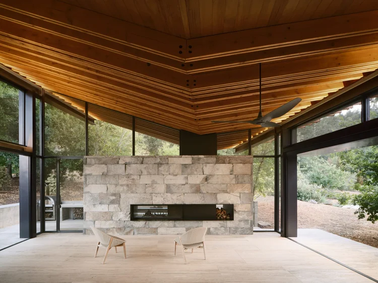 Whistler Basalt panel veneer in a natural face with dry-stack joints across a fireplace surround.